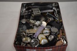 A tin of assorted fashion watches various styles and designs.