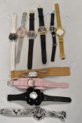 Ten ladies watches, various brands including Playboy, Armani, Oasis and more.