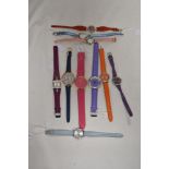 Ten girls/ladies bright coloured watches