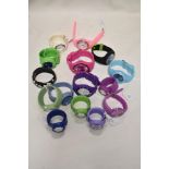 Fifteen bright coloured watches, iincluding snap bands.