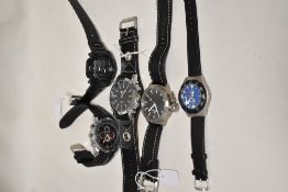 Five mens watches all having black straps.