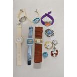 Ten watches including thick leather strapped and two loose watch faces.