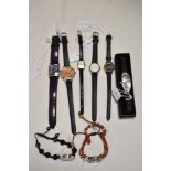 Ten ladies silver tone watches, one being a bracelet with coloured gems, also included are Sekonda