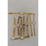 Nine ladies watches, having gold tone straps, including Sekonda.