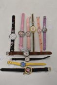 Ten ladies/girls watches including Disney and Hello Kitty.
