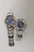 Two mens watches both silver tone with blue faces, one being Accurist.