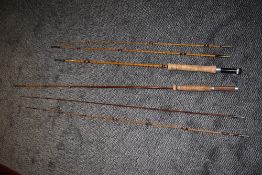A very light split cane two piece fly rod with a spare tip made by JJS Walker Alnwick and a three