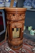 A Victorian Doulton Lambeth jardiniere stand with ceramic body under brown glaze with pierced