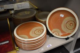 A set of Denby Fire Chilli dinner side and cake plates
