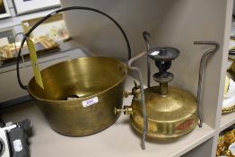 A brass cast jam pan and a Buflam pressure stove