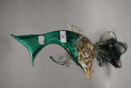 A mid century art glass fish ornament possibly Murano having jade green white and copper body