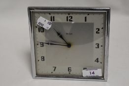 An Art Deco Smiths mantel clock with chrome frame