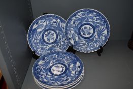 Five modern Chinese porcelain dinner plates in traditional blue and white pattern