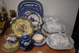 A large collection of blue and white platters, plates and tureens also included is a selection of