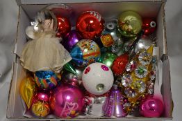 A selection of vintage mid century Christmas decorations including glass baubles