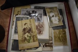 A late 19th Naval hat, marked Whitaker and Co, London to inside and an assortment of photographic