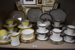 Two Art Deco part tea services including Phoenix chequer pattern