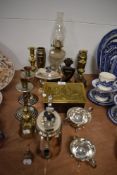 A selection of vintage metal ware, to include tea pots, candlesticks, bells, and more, also included