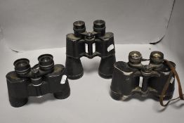 Three pairs of binoculars including USSR 12x40, Hilkinson 8x40 and Regent 12x50