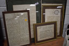 A selection of framed 18th century legal documents and indentures of Westmorland and Cumberland