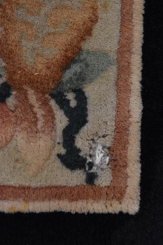 A modern Chinese style carpet runner in beige and black ground with a floral and fruit border - Image 3 of 5