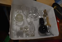 A selection of cut and blown glass decanter stoppers