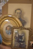 Two early 20th century picture or photo frames including an oval form and one ornate gilt and