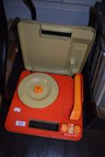 A mid century Fisher Price vinyl record player