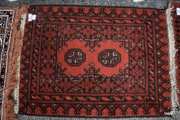 An early 20th century Turkish style prayer mat or rug