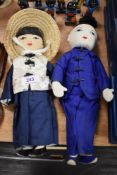 Two modern 20th century reticulated dolls of a Chinese couple