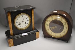 A late Victorian mantel clock of slate and marble with enamel dial, and a later oak Art Deco clock