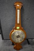 An early 20th century L Gasartelli large sized aneroid banjo form barometer with oak casing and