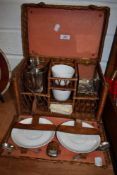 A fine Edwardian portable picnic or tea set complete with silver plated storage tins, spirit