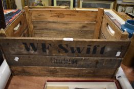 A vintage wooden advertising crate for WF Swift, Charleton.