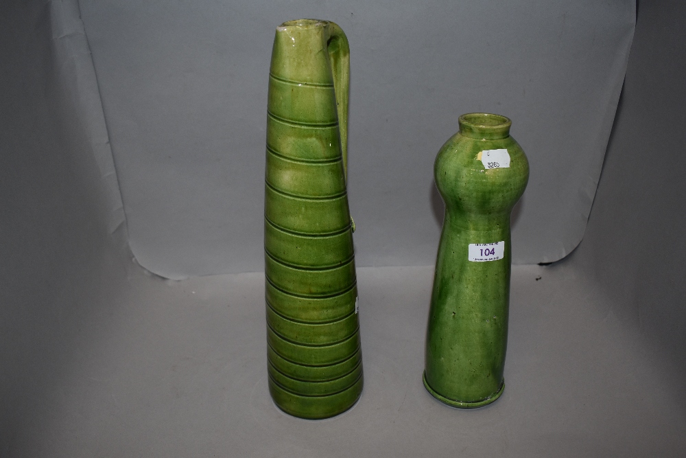 Two Arts and Crafts era studio pottery pieces both having olive green glazes both unsigned