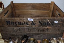 A vintage wooden crate marked Haynes & Sons