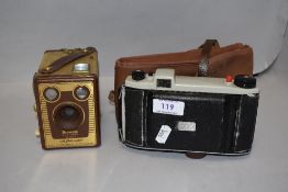 Two 20th century photography cameras including a Kodak Brownie F and an unmarked camera body