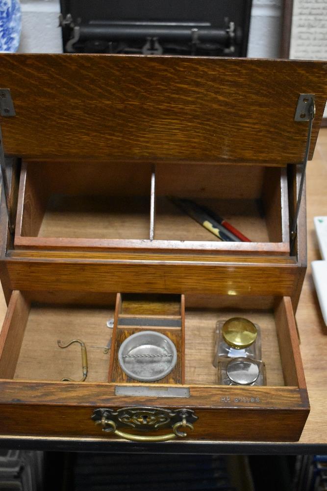 A fine Edwardian writers case in oak with brass banding and duel drawer and lid opening mechanism - Image 2 of 2
