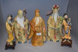 Three large Chinese resin cast figures possibly Immortals and two similar figures. Damage to staff