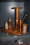 A selection of vintage mill workers and textile industry items including bobbins, shuttles etc