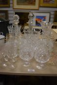 A selection of vintage clear cut crystal glass wares including decanters, vase and hand painted shot