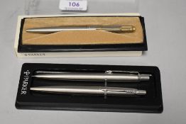 Three modern Parker ball point pens having original boxes and case