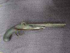 A British Double Barrelled Holster Pistol (af) with Silver mounts hallmarks Birmingham 1800