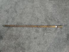 An early 20th century combination Drinking-Walking Stick, bamboo effect stick, screw top revealing