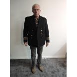 An early/mid 20th century Royal Navy Officers Reserve Jacket and Great Coat, both complete with