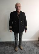 An early/mid 20th century Royal Navy Officers Reserve Jacket and Great Coat, both complete with