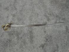 A British Light Cavalry Sword, 1821 pattern, brass guard, wired leather grip, blade edge has