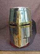 A reproduction medieval Knights Steel Helmet with wooden stand