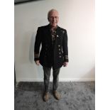 A WW2 Naval Commanders Jacket having eight brass Naval buttons three woven rings on cuffs, 39-45