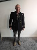 A WW2 Naval Commanders Jacket having eight brass Naval buttons three woven rings on cuffs, 39-45